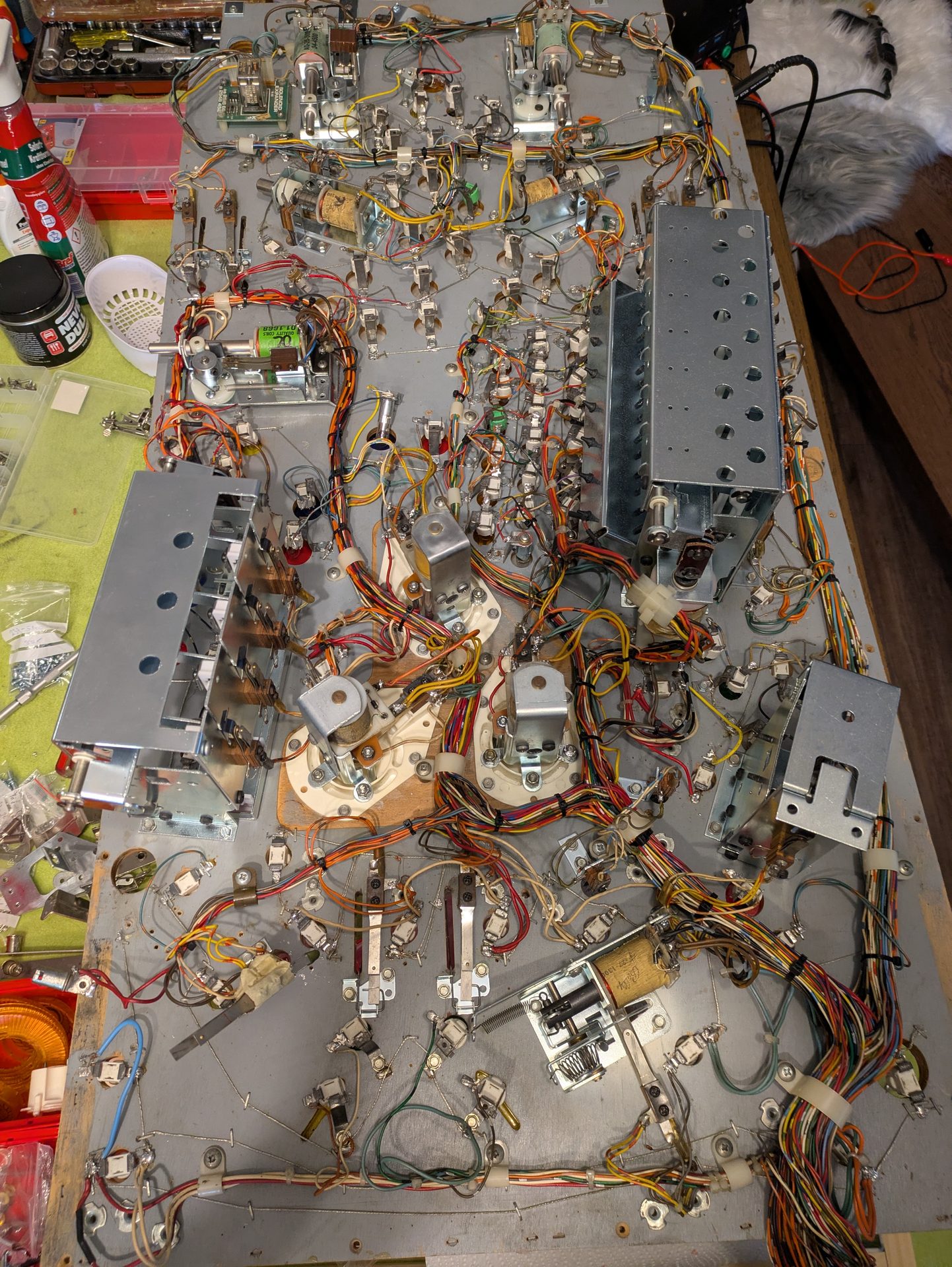Under the playfield partially equipped with new parts
